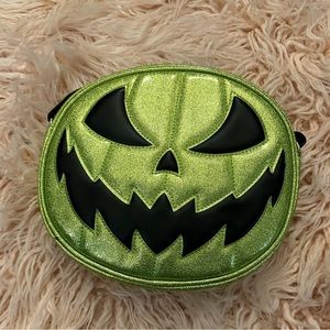 Love pain and stitches 2 sided green glitter purse